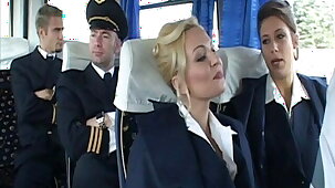 Sexy stewardess bowed to have sex before the end of flight